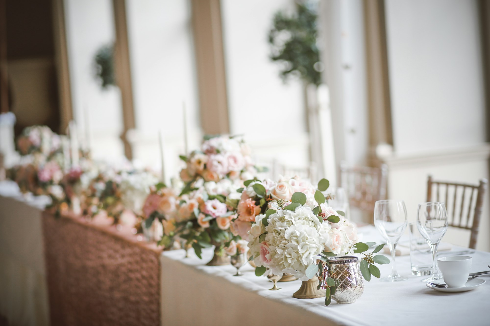 A softly lit fine dining table set for a special occasion.